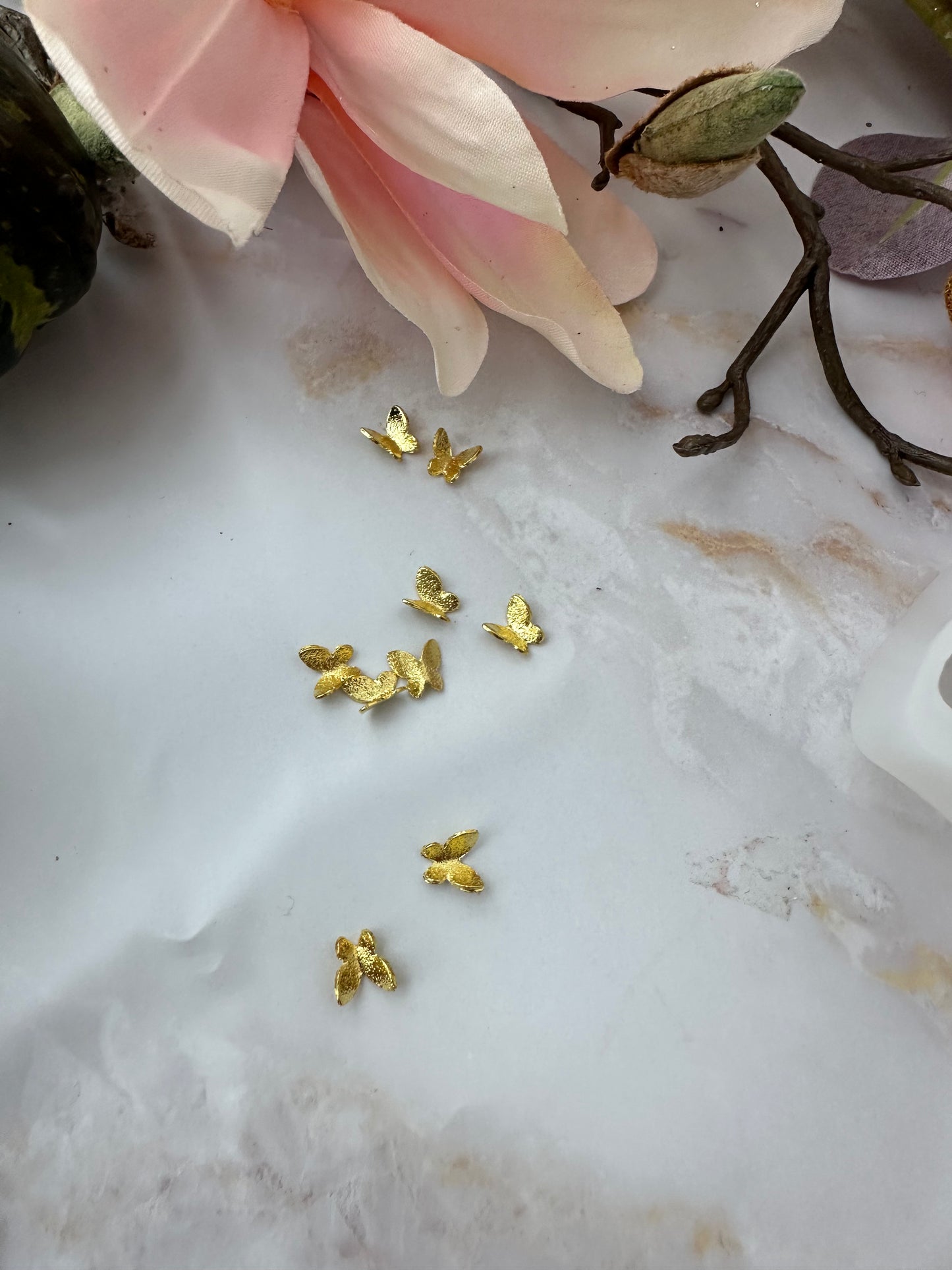 Schmetterlinge in Gold