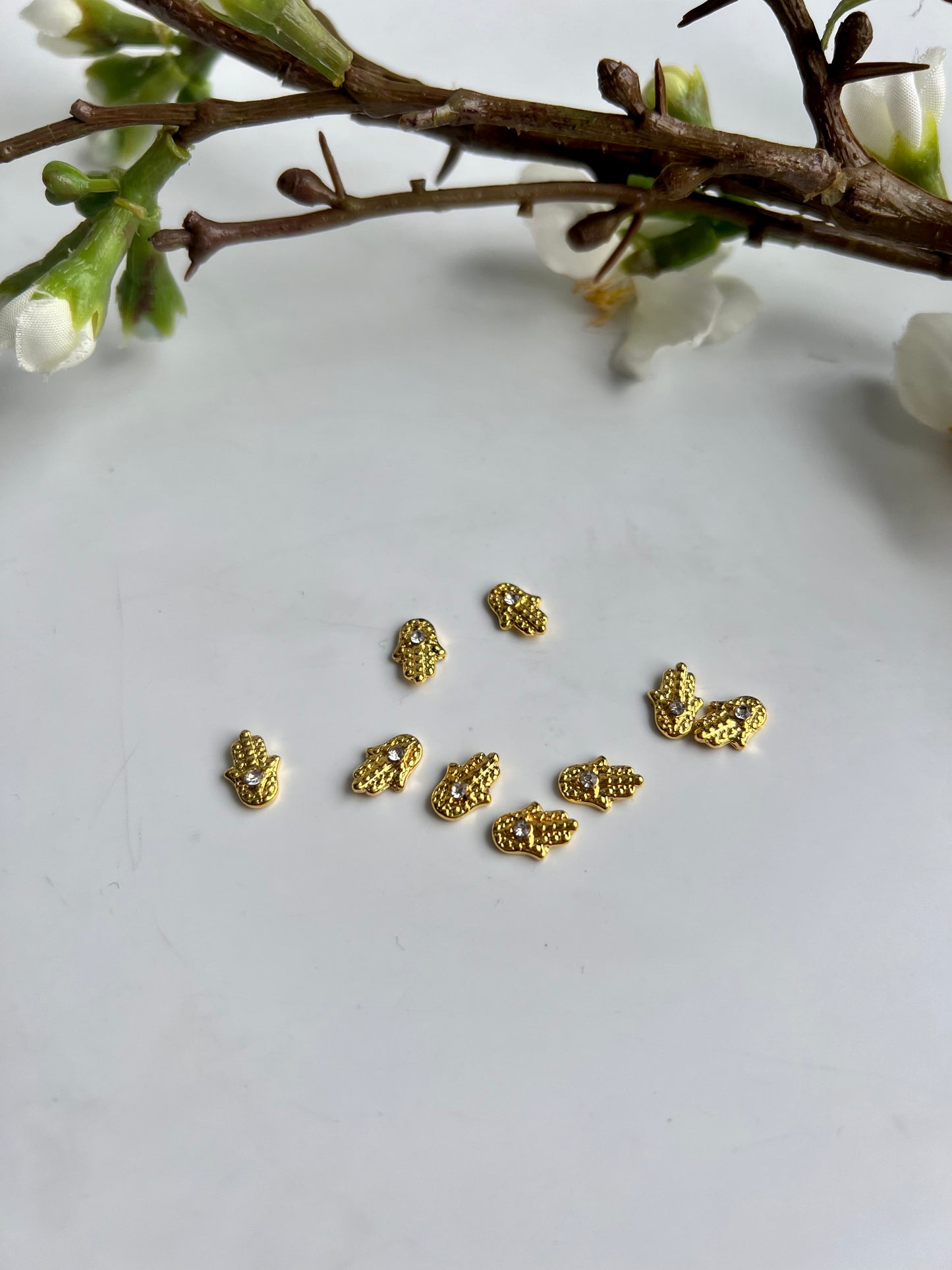 Hamsa Fatimas Hand in Zartgold mit Glitzersteinchen