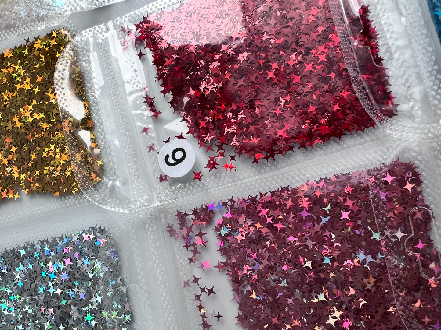 Holographische Glitzer Sterne mit 4 Zacken